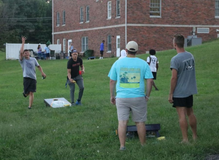 Men playing cornhole during Fraternity Rush in 2018. Photo from Megan Ferry.