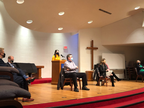 Panelists prepare for the beginning of the Town Hall.