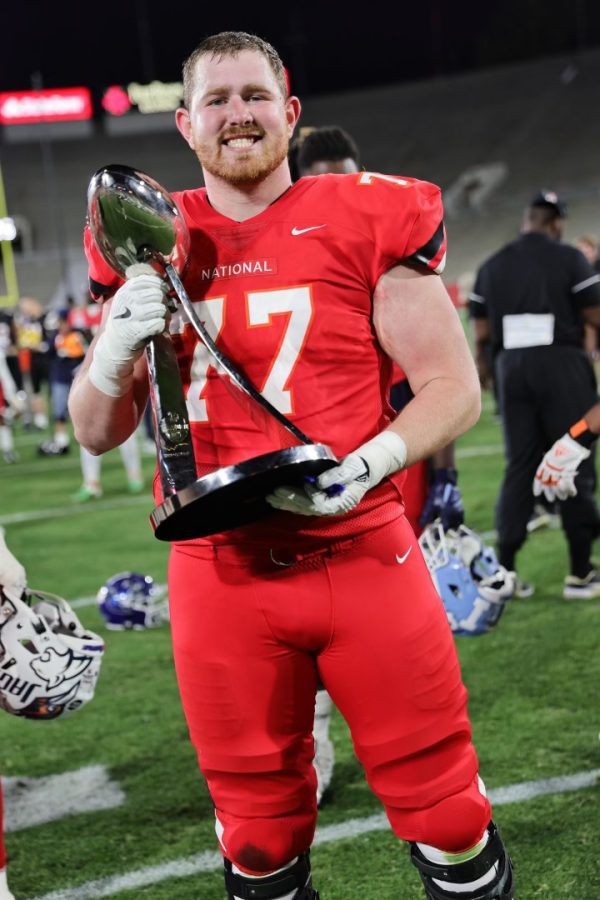 Andrew+%E2%80%9CRupe%E2%80%9D+Rupcich+Holding+the+Winning+trophy+from+the+NFLPA+Collegiate+Bowl