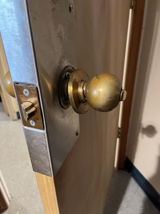 Broken door handle in McDonald Residence Hall, Aug. 20.