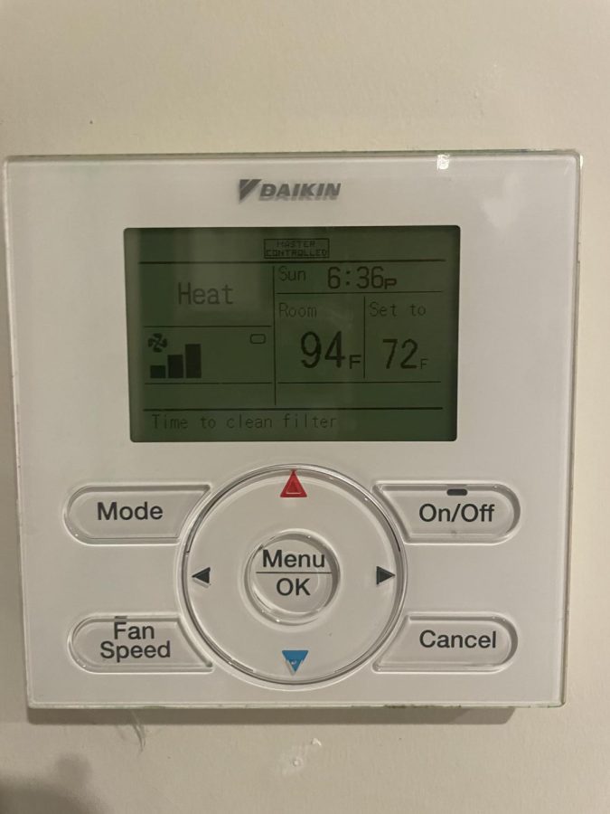 Stone resident Ermoni Reddens thermostat at 94 degrees.  