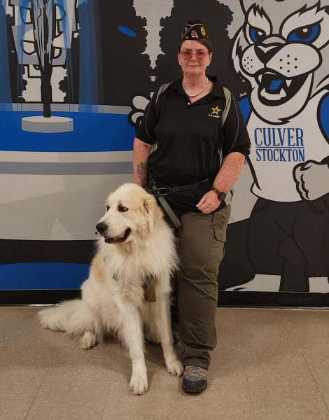 Rachel Bearce and the club's unofficial mascot, Thunder.