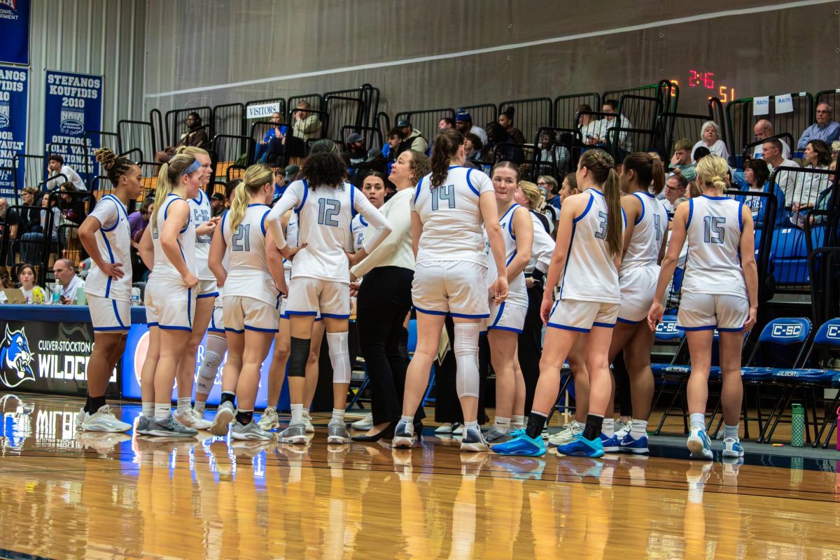 Women's Basketball huddle during playoff game against Missouri Valley